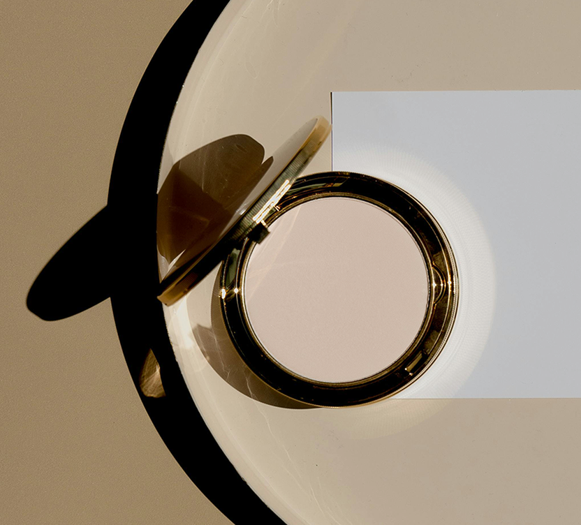 Close-up of a ceiling light fixture with a neutral background